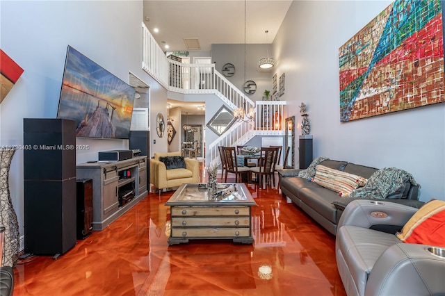 living room with a high ceiling