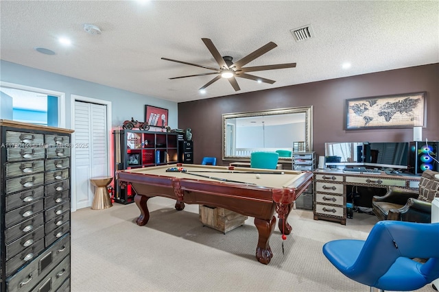 game room featuring light carpet, ceiling fan, a textured ceiling, and pool table