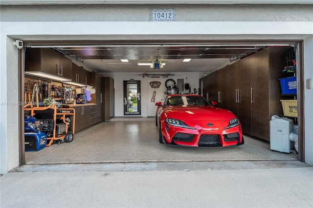 garage featuring a garage door opener