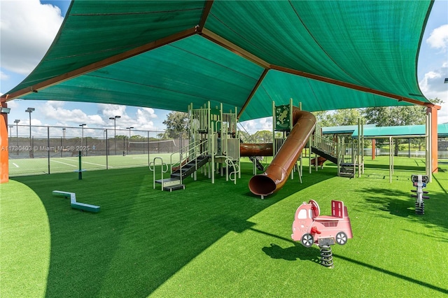 view of playground featuring a yard