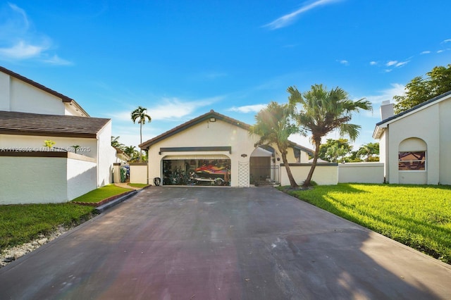 view of side of home featuring a garage and a yard