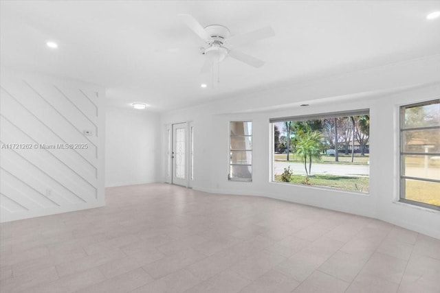 unfurnished room featuring ceiling fan