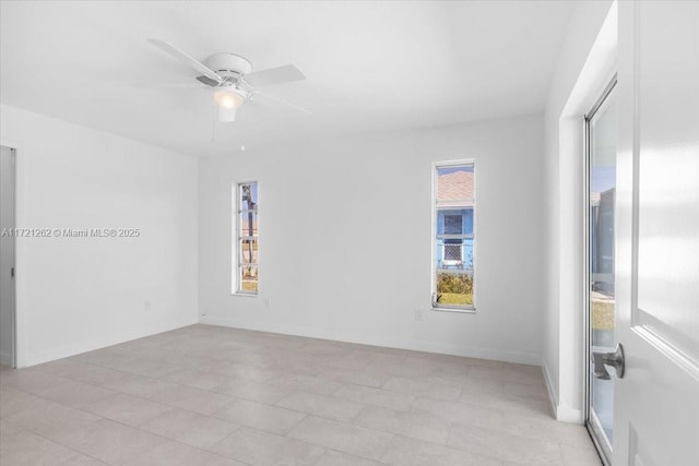 spare room featuring ceiling fan