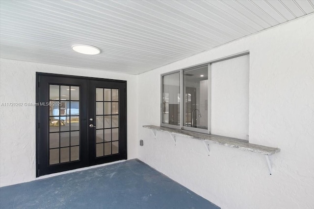 property entrance with french doors