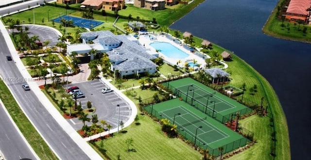 birds eye view of property featuring a water view