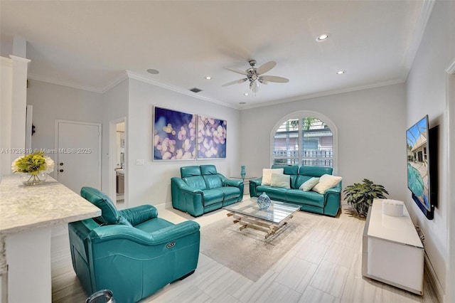 living room with crown molding and ceiling fan