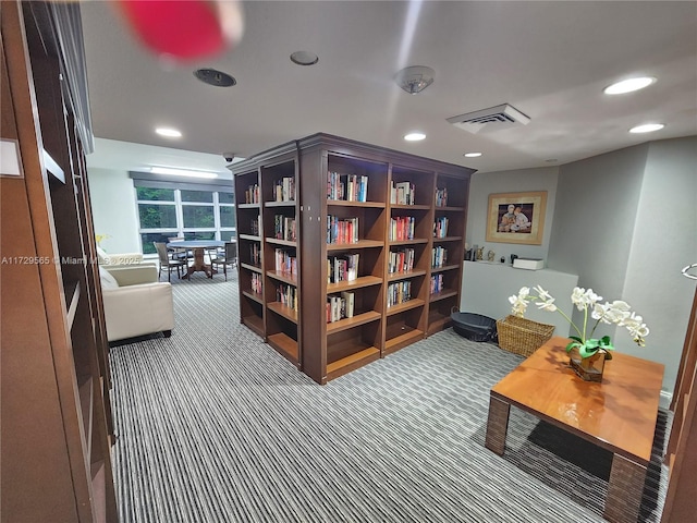 sitting room featuring carpet