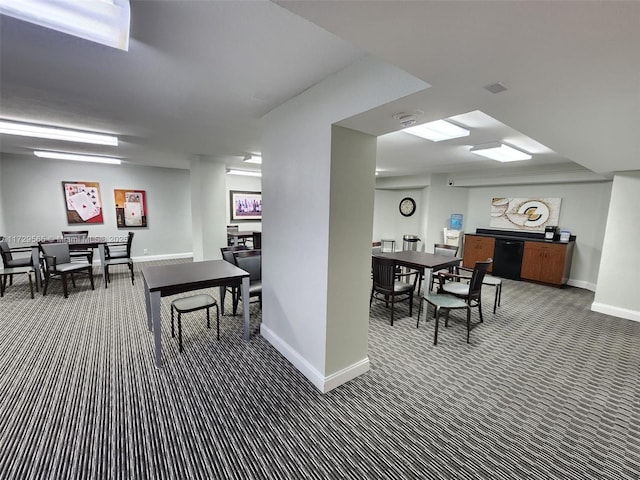 view of carpeted dining area