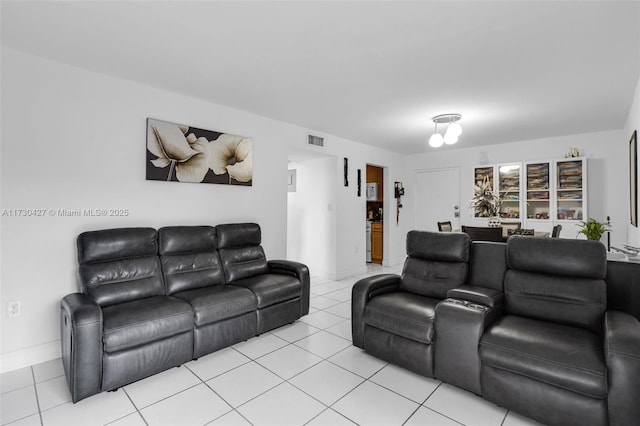 living room featuring light tile patterned floors