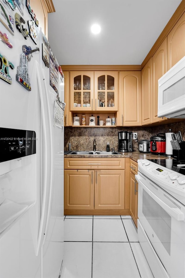 kitchen with white appliances, light brown cabinets, sink, backsplash, and light tile patterned flooring