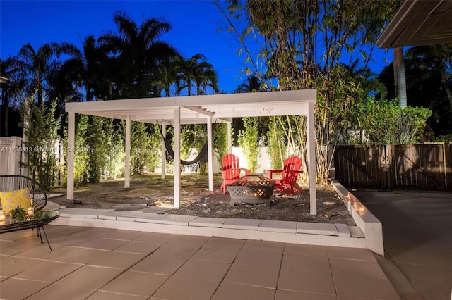 view of patio / terrace with a fire pit