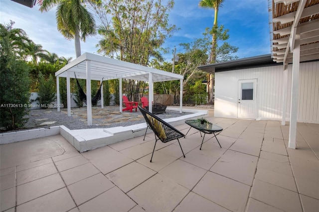 view of patio featuring a pergola