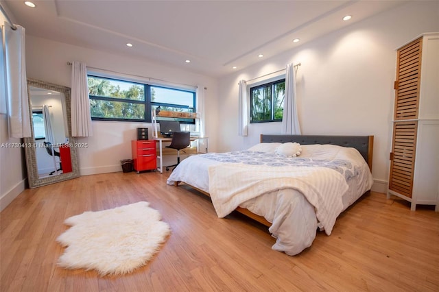 bedroom featuring light hardwood / wood-style flooring