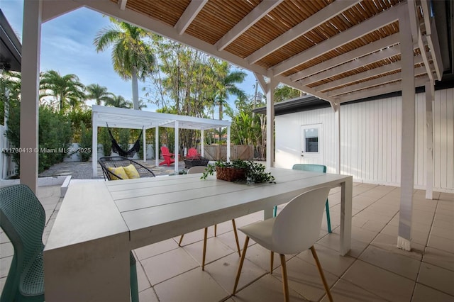 view of patio featuring a pergola