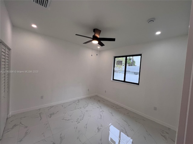 spare room with recessed lighting, visible vents, baseboards, and ceiling fan