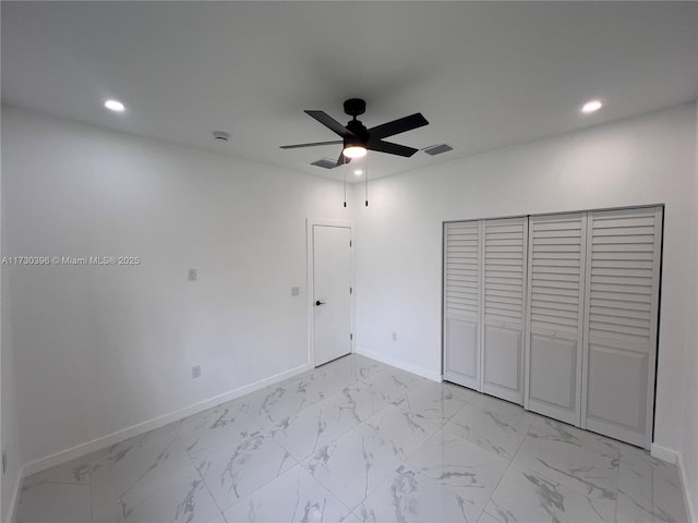 unfurnished bedroom featuring marble finish floor, baseboards, visible vents, and recessed lighting