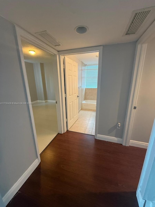 hall featuring hardwood / wood-style flooring