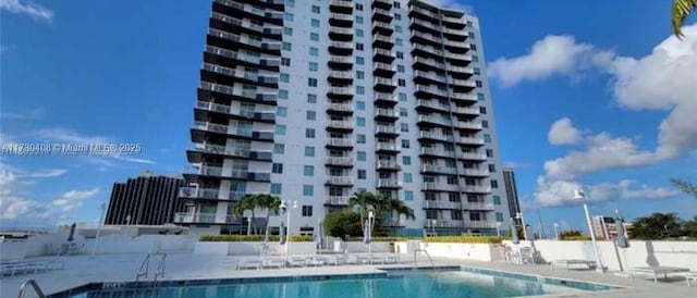 view of pool with a patio area