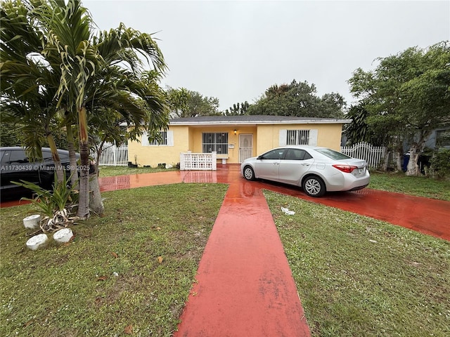 view of front of home with a front yard