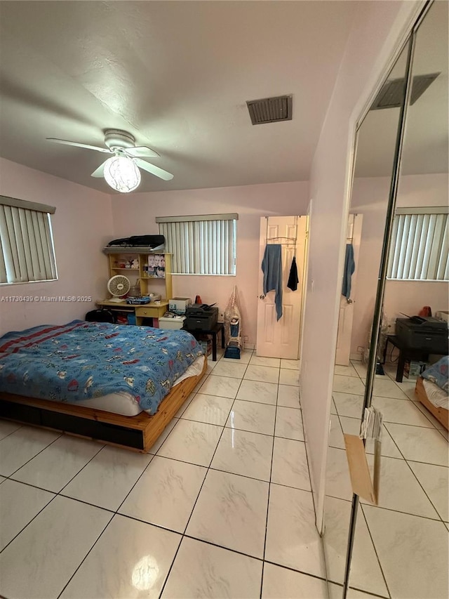 bedroom featuring ceiling fan