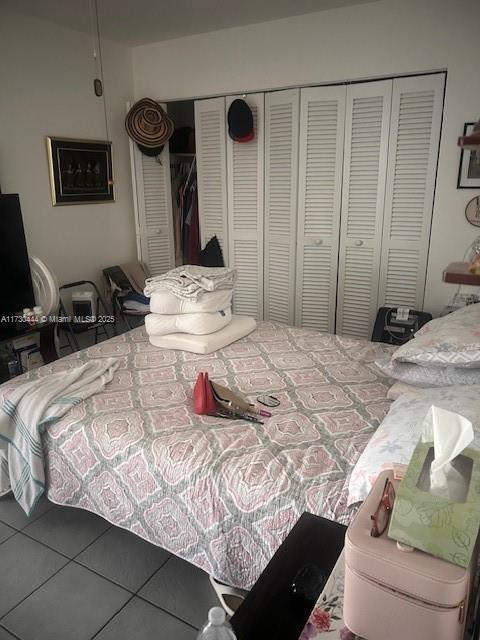 bedroom with tile patterned flooring