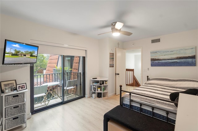 bedroom with access to exterior, visible vents, light wood finished floors, and a ceiling fan