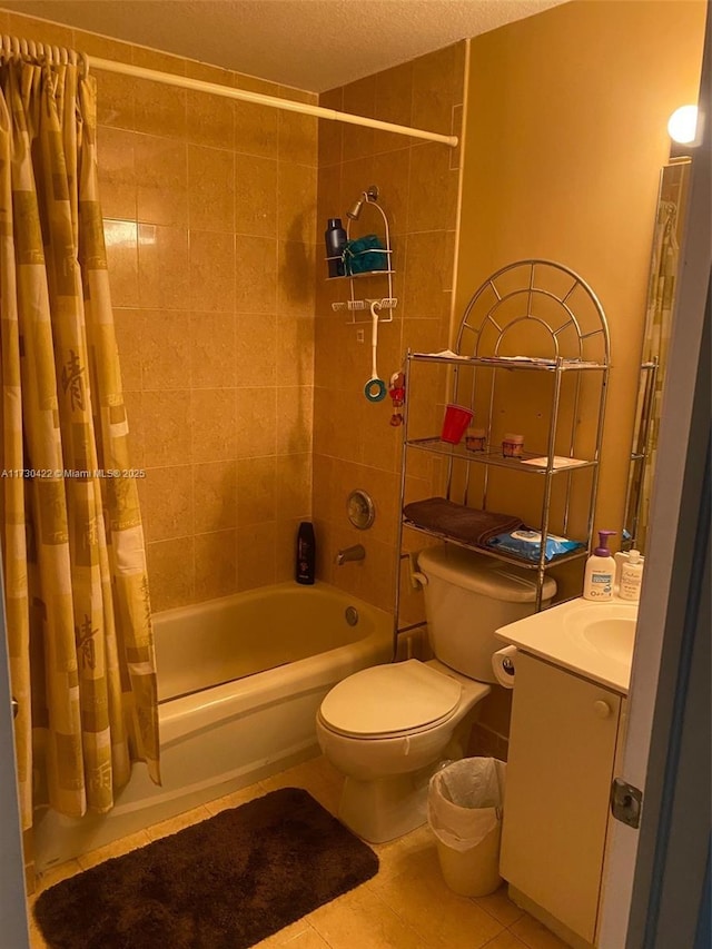 full bathroom with toilet, shower / tub combo, a textured ceiling, tile patterned floors, and vanity