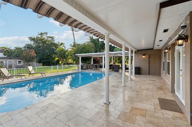 view of pool with a patio and a pergola