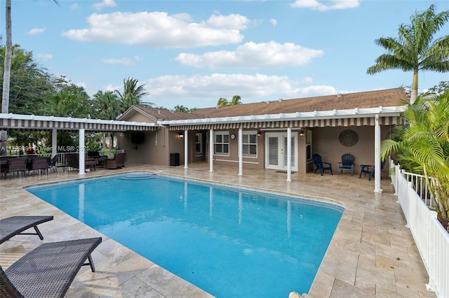 view of pool featuring a patio