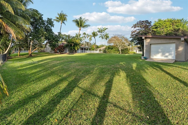 view of yard featuring a garage