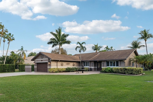 single story home with a front yard and a garage