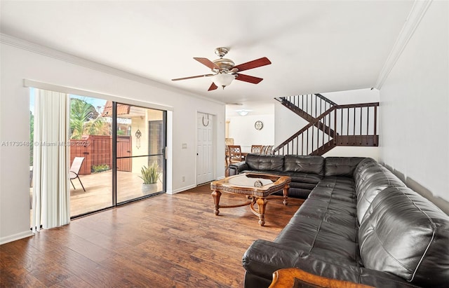 living room featuring ceiling fan, hardwood / wood-style floors, and crown molding