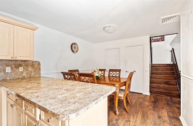 dining room featuring dark hardwood / wood-style floors