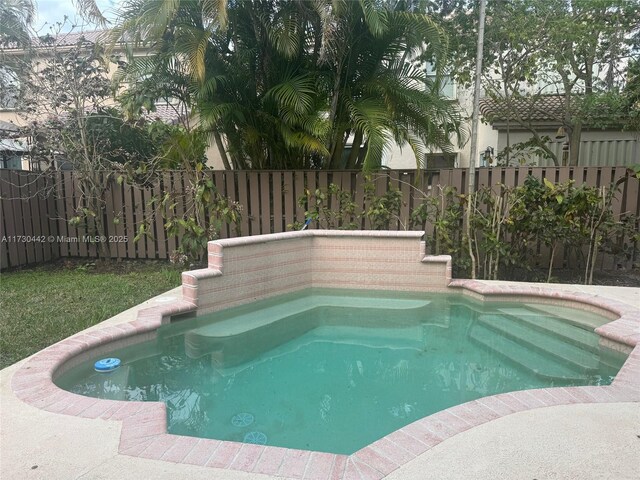 10781 NW 12th Dr, Plantation, FL 33322 - view of pool with a fenced backyard