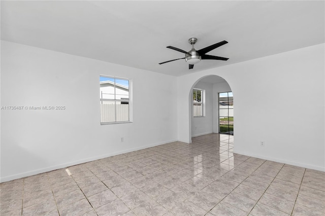 unfurnished room with ceiling fan