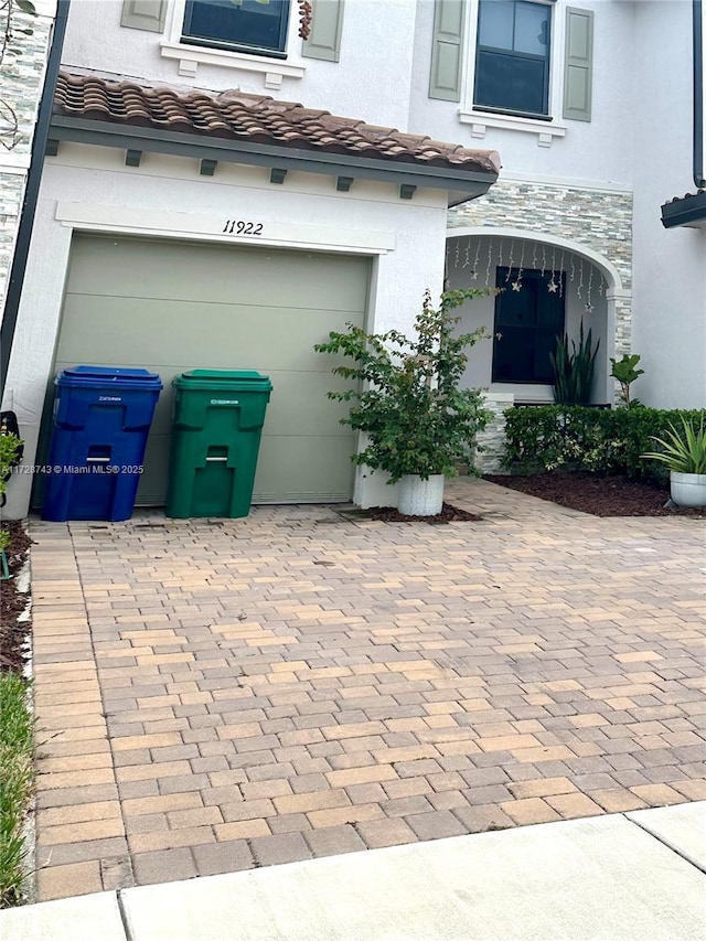 property entrance featuring a garage