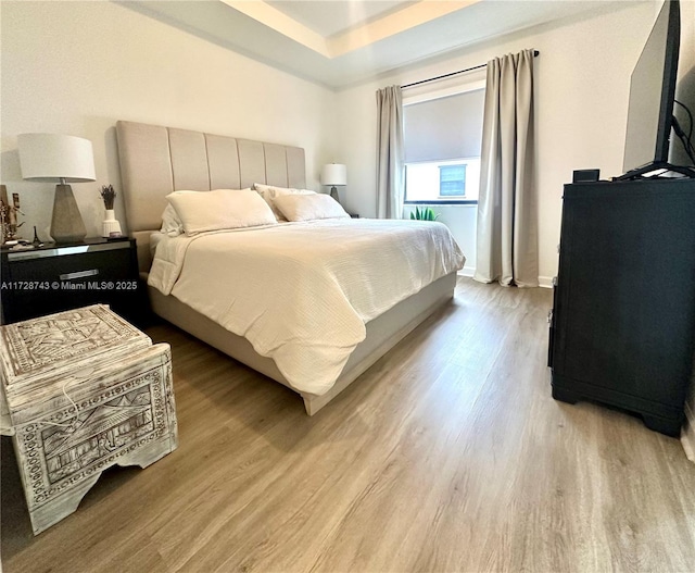 bedroom featuring light wood-type flooring