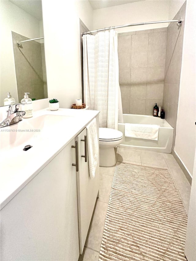 full bathroom with tile patterned flooring, toilet, vanity, and shower / tub combo with curtain