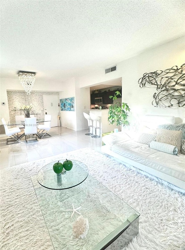 living room featuring a textured ceiling