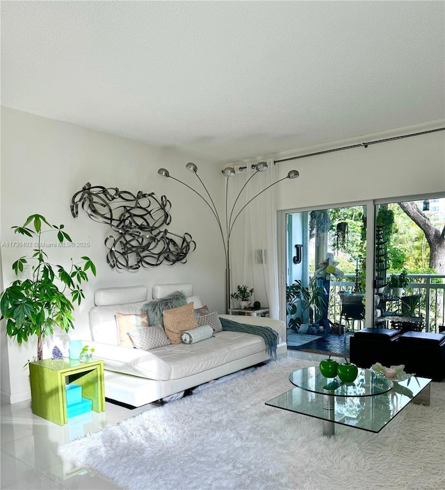 living room featuring a textured ceiling