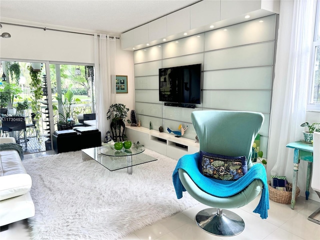 living room with light tile patterned flooring