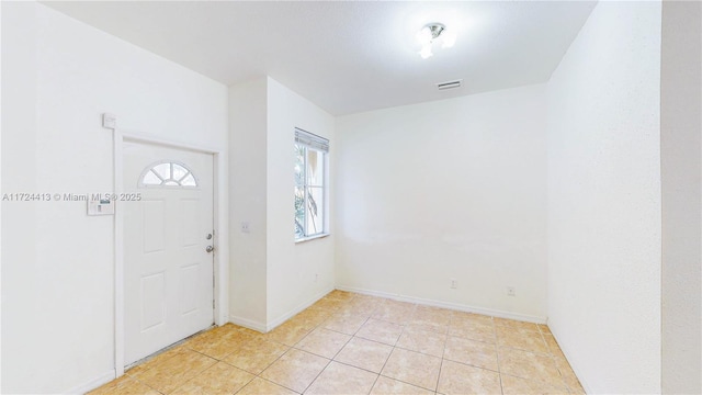 view of tiled entrance foyer