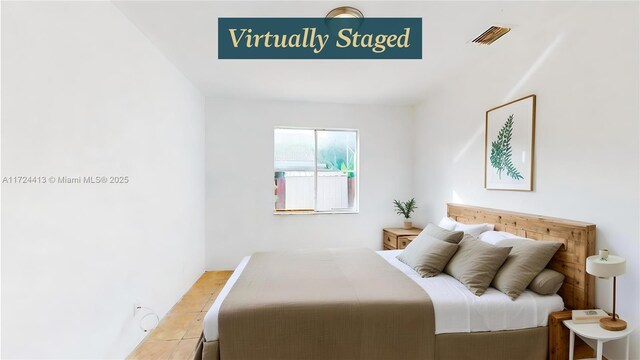 empty room featuring light tile patterned floors