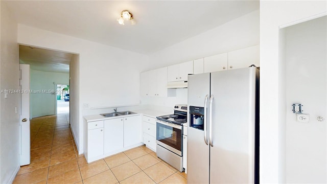 kitchen featuring sink, white cabinetry, appliances with stainless steel finishes, and light tile patterned flooring