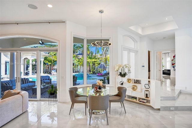 dining room with a wealth of natural light and french doors