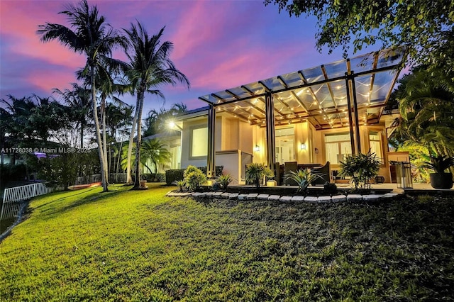 yard at dusk with a patio