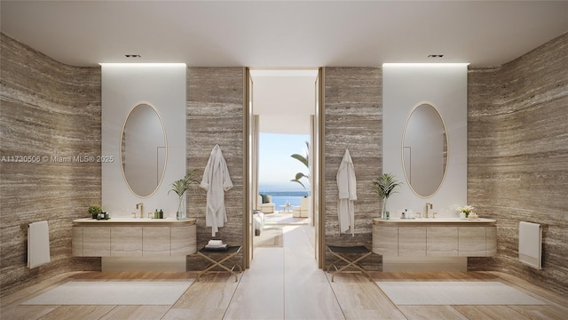 bathroom featuring vanity and a water view