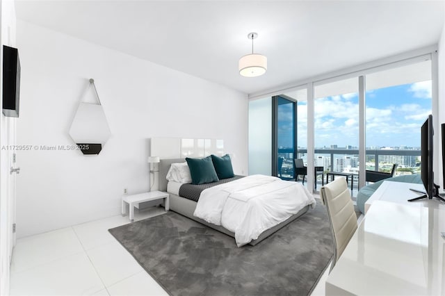 tiled bedroom featuring floor to ceiling windows