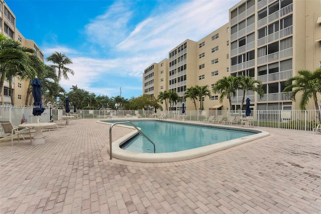 view of pool featuring a patio area