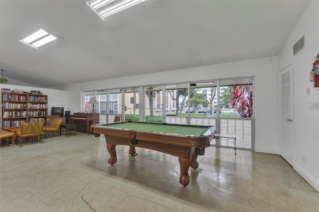 game room with vaulted ceiling and billiards